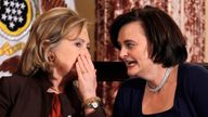 U.S. Secretary of State Hillary Clinton (L) confers with Cherie Blair, wife of former British Prime Minister Tony Blair, at a State Department event to discuss international support for increasing women&#39;s access to mobile technology, at the State Department in Washington, October 7, 2010. REUTERS/Jason Reed (UNITED STATES - Tags: POLITICS BUSINESS SOCIETY)