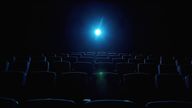 Inside a dark cinema with the projector on. Pic: iStock