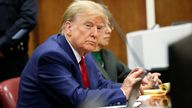 Donald Trump sits in the courtroom 
Pic: Reuters