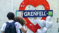 People at a memorial to those who died in the Grenfell Tower fire in 2018. Pic: PA