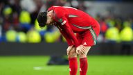 Wales&#39; Kieffer Moore dejected following defeat to Poland. Pic: PA