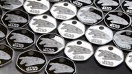 Millennium Falcon 50p silver coins.
Pic: PA