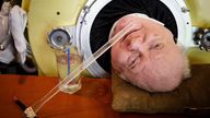 Paul Alexander looks out from inside his iron lung at his home in Dallas  
Pic: The Dallas Morning News