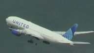 In this image taken from video provided by Cali Planes, a United Airlines Boeing 777 bound for Japan loses a tire as it takes off from San Francisco International Airport, Thursday, March 7, 2024. The plane made a safe emergency landing in Los Angeles. (Cali Planes via AP)