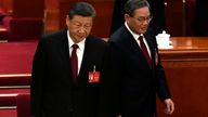 Chinese President Xi Jinping, left, and Chinese Premier Li Qiang arrive for the opening session of the National People&#39;s Congress. Pic: AP