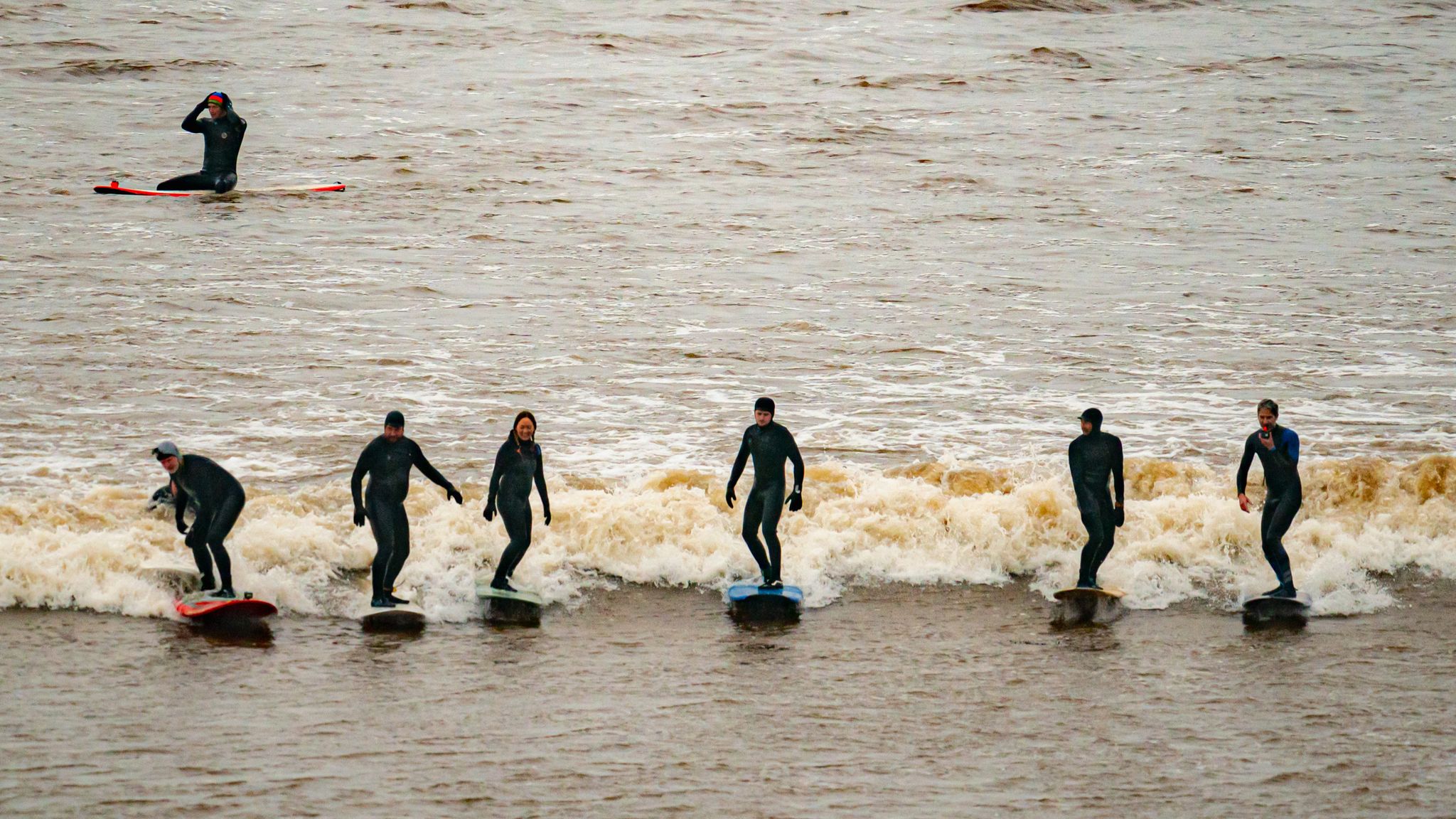 Surfers ride Severn Bore tidal surge in Gloucestershire | UK News | Sky ...