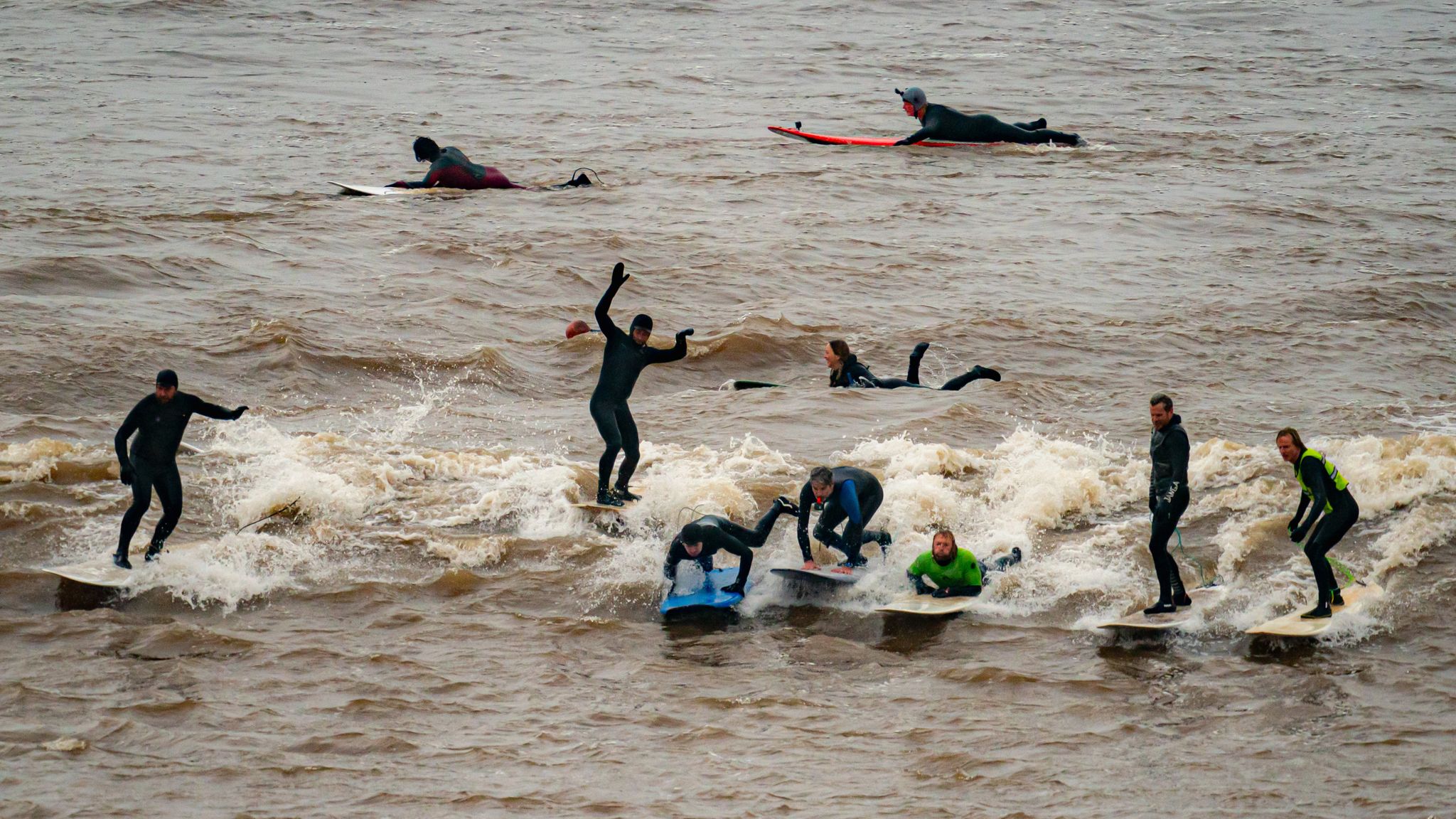 Surfers ride Severn Bore tidal surge in Gloucestershire | UK News | Sky ...