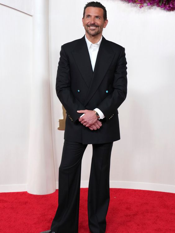 Bradley Cooper in bell bottoms and some fun button detail. Pic: AP