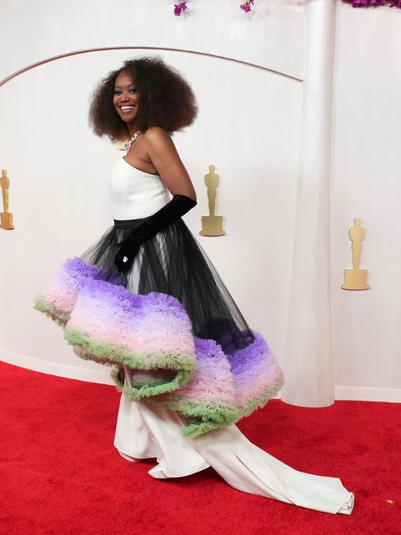American Fiction actress Erika Alexander in a sweeping cream dress with show-stopping lace tulle to boot. Pic: Associated Press