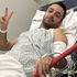 Iranian journalist shares defiant photo of himself after being stabbed in London