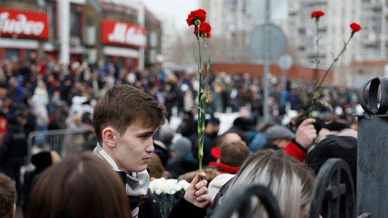 People gather near the Soothe My Sorrows church, where a funeral service and a farewell ceremony for Russian opposition politician Alexei Navalny are held, in Moscow, Russia, March 1, 2024. REUTERS/Stringer