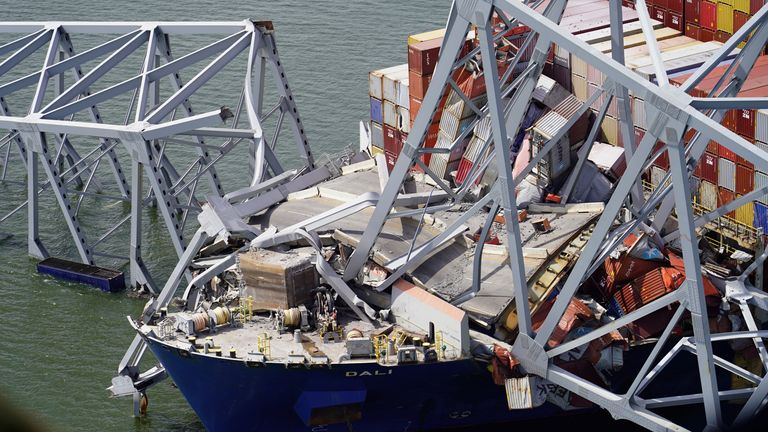 Pic: Reuters
Aerial view of the Dali cargo vessel which crashed into the Francis Scott Key Bridge, causing it to collapse in Baltimore, Maryland, U.S., March 26, 2024. Maryland National Guard/Handout via REUTERS. THIS IMAGE HAS BEEN SUPPLIED BY A THIRD PARTY