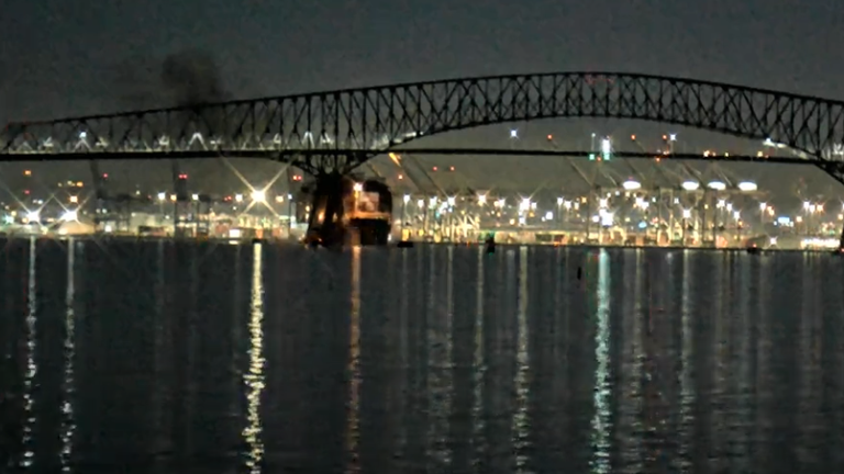 A ship can be seen colliding with one of the bridge&#39;s supports. Pic: StreamTime LIVE