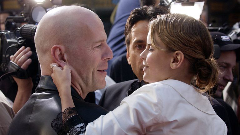 Bruce Willis with his daughter at a premiere in 2004. Pic: AP/Chris Piz
