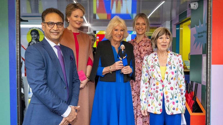 Queen Camilla (centre), president of Women of the World (WOW), was presented with a Barbie doll dressed in her costume in recognition of her support of World of Warcraft. Image: PA                                                                                                                                                                                          