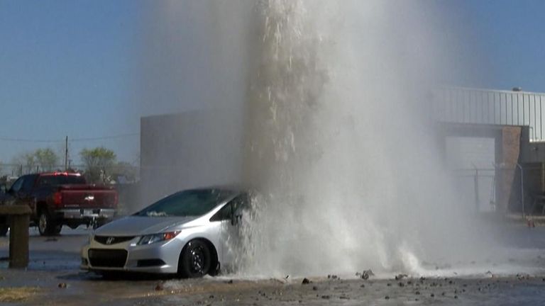 Water main bursts next to car in Wichita