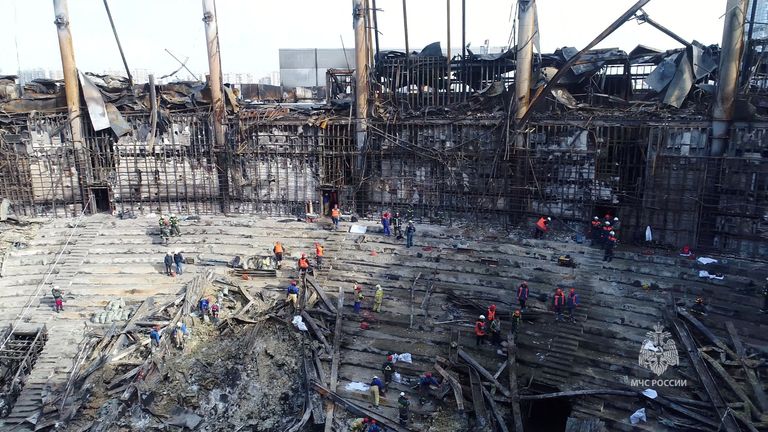 The burnt-out Crocus City Hall following the attack on the concert venue.
Pic: Russian Emergencies Ministry/Reuters