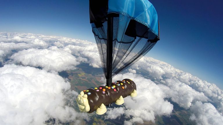 Undated handout photo issued by Aldi of aerial views of a Cuthbert the Caterpillar cake as it reaches 40,000ft to raise money for Aldi�s charity partner, the Teenage Cancer Trust and to celebrate the cake&#39;s return to stores on Monday May 17. Issue date: Wednesday May 12, 2021.
