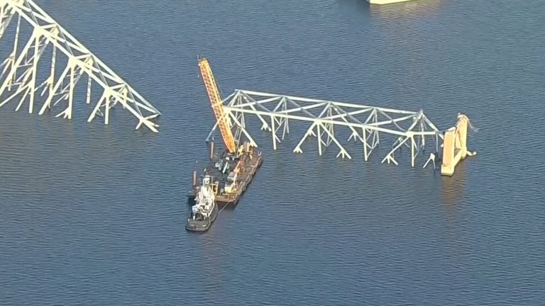A crane at the collapsed Baltimore bridge. pic: AP