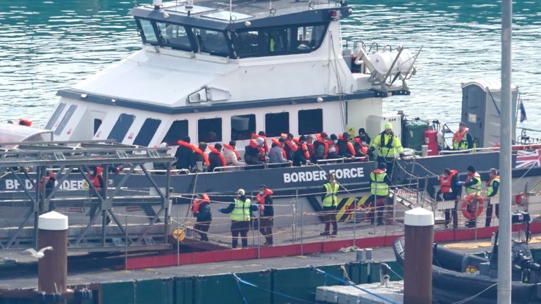 A group of people thought to be migrants are brought in to Dover, Kent, from a Border Force vessel following a small boat incident in the Channel. Picture date: Tuesday March 26, 2024.


