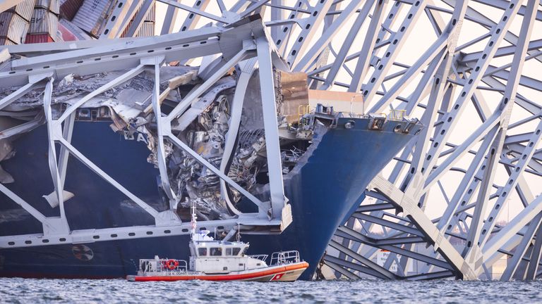 Pic: Jim Lo Scalzo/EPA-EFE/Shutterstock
The Francis Scott Key Bridge rests partially collapsed after a cargo ship ran into it in Baltimore, Maryland, USA, 26 March 2024. 