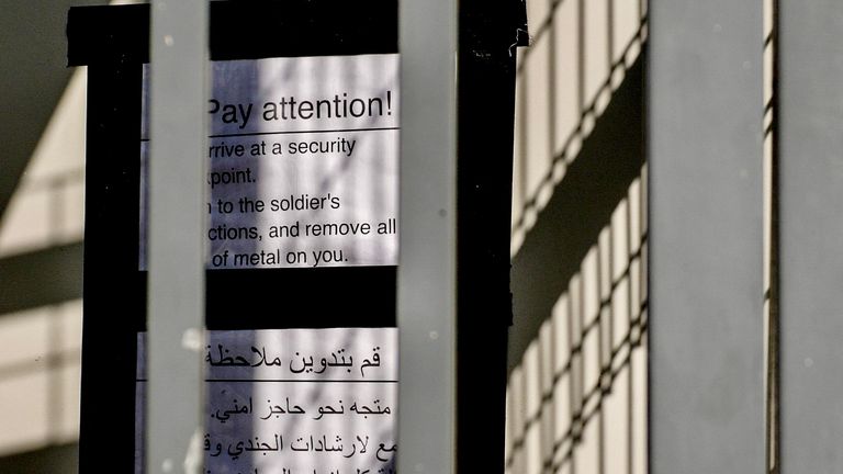 A checkpoint sign on the outside of Hebron.