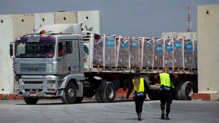 A truck carrying humanitarian aid bound for the Gaza Strip at the Kerem Shalom crossing in southern Israel on 14 March. Pic: Reuters