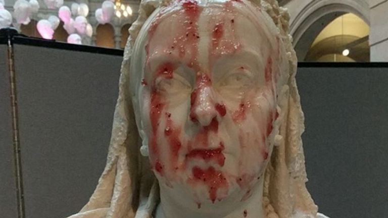 Handout photo issued by This Is Rigged of a bust of Queen Victoria on the plinth at Glasgow&#39;s Kelvingrove Art Gallery and Museum after protesters poured porridge and jam over it. Sorcha Ni Mhairtin, 30, and Hannah Taylor, 23 from This Is Rigged carried sprayed painted the word c*** on the plinth before reportedly gluing themselves to it. The group said it carried out the act to protest against increasing food insecurity. Issue date: Sunday March 3, 2024.