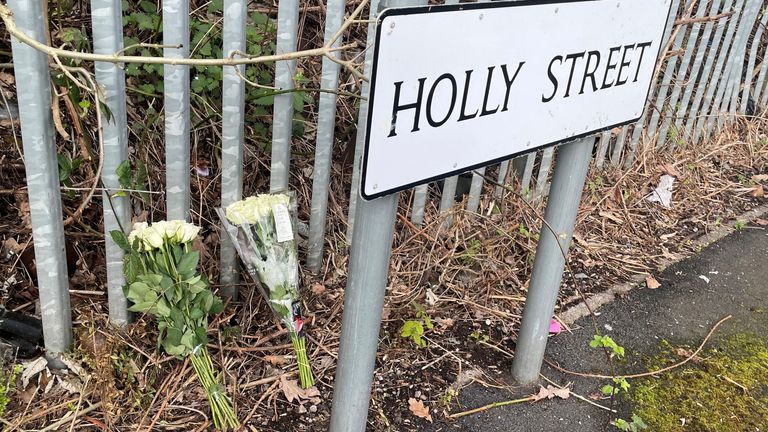 Flowers at the scene in Beswick. Pic: PA
