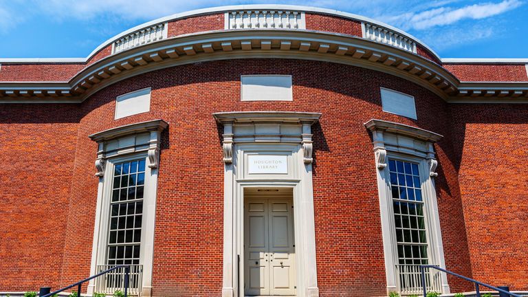 Cambridge, Massachusetts, USA - May 26, 2021: The Houghton LIbrary building is in Harvard University&#39;s Harvard Yard. Opened in 1942, it is part of the Harvard College Library and is a repository for rare books and manuscripts.