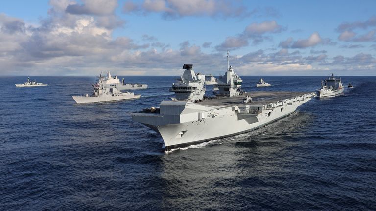 HMS Prince of Wales aircraft carrier of the Royal Navy leads fifteen ship formation as jets fly past at sea for Exercise Nordic Response 24.
Pic: MOD/AP