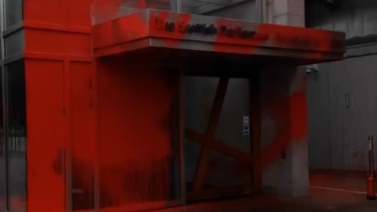 The Scottish Parliament was sprayed with red paint. Pic: This Is Rigged