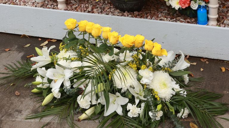 A floral tribute at a commemoration and remembrance service in Creeslough on the first anniversary of the explosion. Pic: PA 
