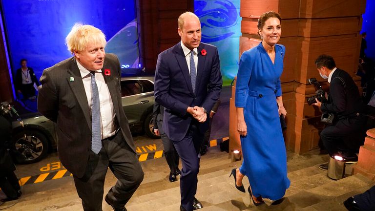 British Prime Minister Boris Johnson, left, greets Britain&#39;s Prince William and Kate, Duchess of Cambridge as they arrive to attend an evening reception to mark the opening day of the COP26 U.N. Climate Summit, in Glasgow, Scotland, Monday, Nov. 1, 2021. The U.N. climate summit in Glasgow gathers leaders from around the world, in Scotland&#39;s biggest city, to lay out their vision for addressing the common challenge of global warming. (AP Photo/Alberto Pezzali, Pool)


