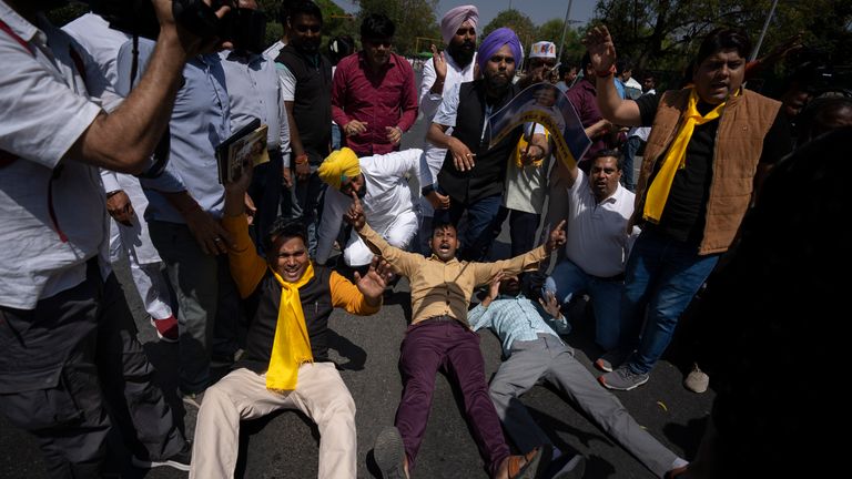 Supporters of the Aam Aadmi Party, or Common Man&#39;s Party, shout protest slogans during a protest against the arrest of their party leader Arvind Kejriwal, in New Delhi, India, Saturday, March 23, 2024. Hundreds of protesters in India&#39;s capital took to the streets for a second day Saturday, demanding to the immediate release of one of the Indian Prime Minister Narendra Modi&#39;s top rivals, as the country gears up for a national election next month. (AP Photo/Altaf Qadri)