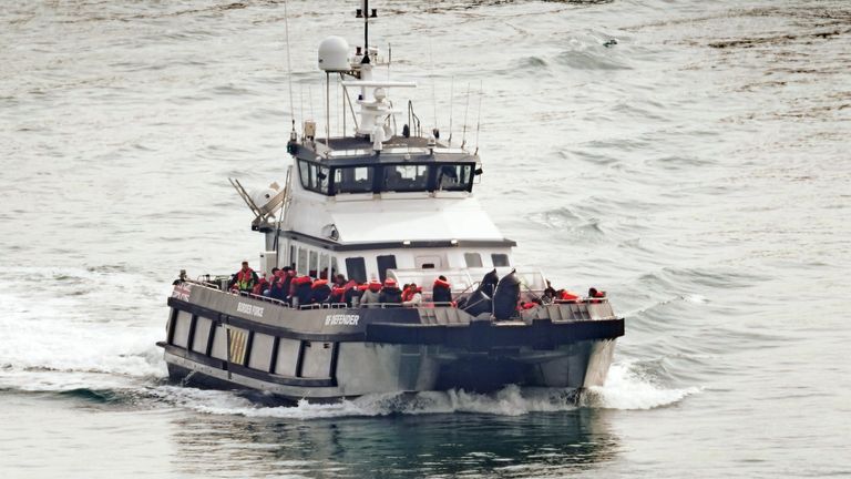 A group of people, including children, thought to be migrants are brought into Dover, Kent following a small boat incident in the Channel
Pic: PA