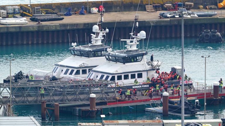 A group of people thought to be migrants are brought in to Dover, Kent.
Pic: PA