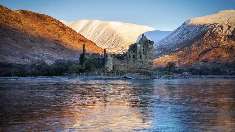 Kilchurn Castle on the banks of a partially frozen Loch Awe. Pic: PA
