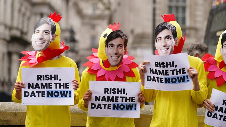 Demonstrators dressed as chickens protested across London's Downing Street as Labor called on Rishi Sunak to set a date for a general election. Image date: Friday, March 15, 2024.