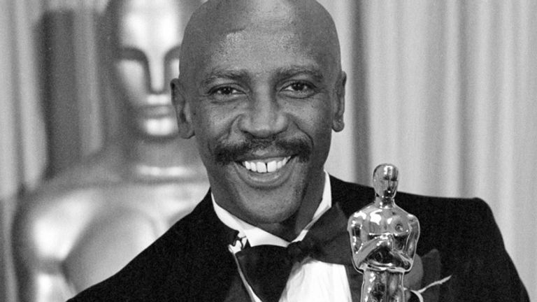 FILE - Louis Gossett Jr., poses with the Oscar for best supporting actor for his role in "An Officer and a Gentleman," at the annual Academy Awards presentation in Los Angeles on April 11, 1983. Gossett Jr., the first Black man to win a supporting actor Oscar and an Emmy winner for his role in the seminal TV miniseries ...Roots,... has died. He was 87. (AP Photo, File)