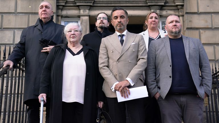 Margaret Caldwell (front left), mother of murder victim Emma Caldwell, and lawyer Aamer Anwar (centre) and other family members stand on the steps of Bute House. Image: PA