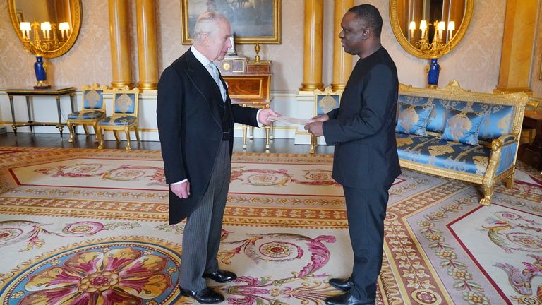 Mbelwa Kairuki, High Commissioner for the United Republic of Tanzania, presents his credentials to King Charles III.
Pic: PA