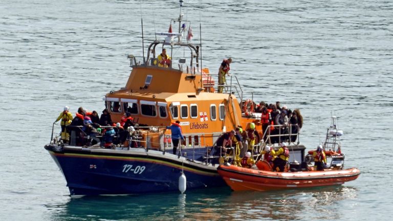 A group of people thought to be migrants are brought in to Dover, Kent.
Pic: PA