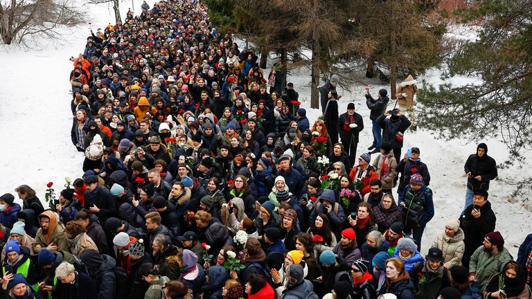 People walk towards the Borisovskoye cemetery during the funeral of Russian opposition politician Alexei Navalny in Moscow, Russia, March 1, 2024. REUTERS/Stringer