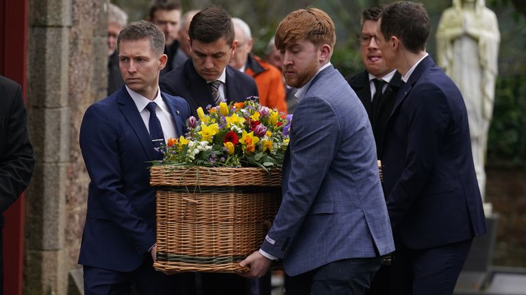 Nick Sheridan&#39;s brother Brian (front left) gave the eulogy during the mass. Pic: PA