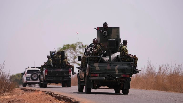 Nigerian army patrol near Kaduna after 300 students were kidnapped. Pic: AP / Sunday Alamba