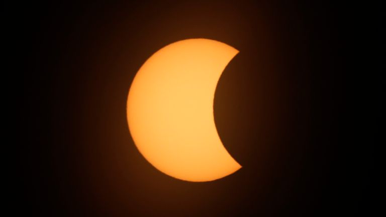 A partial solar eclipse seen from Argentina in December 2020. Pic: AP