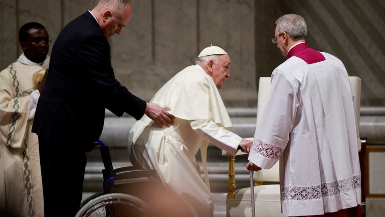 Pope Francis leaves after the Easter Vigil in Saint Peter&#39;s Basilica at the Vatican, March 30, 2024. REUTERS/Yara Nardi
