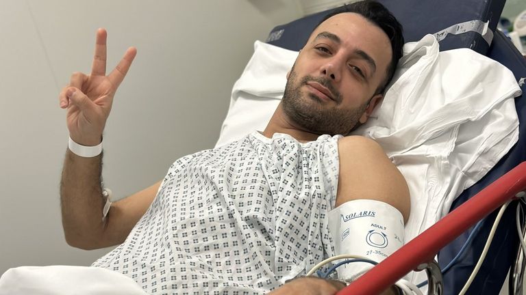 Pouria Zeraati shares photo of himself from hospital bed after being stabbed. Pic: X / @pouriazeraati