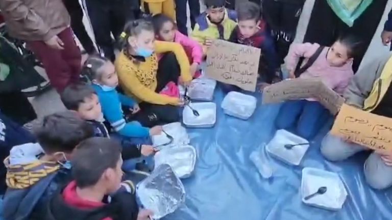 Displaced Palestinians stage protest in Rafah to protest against the lack of food.
